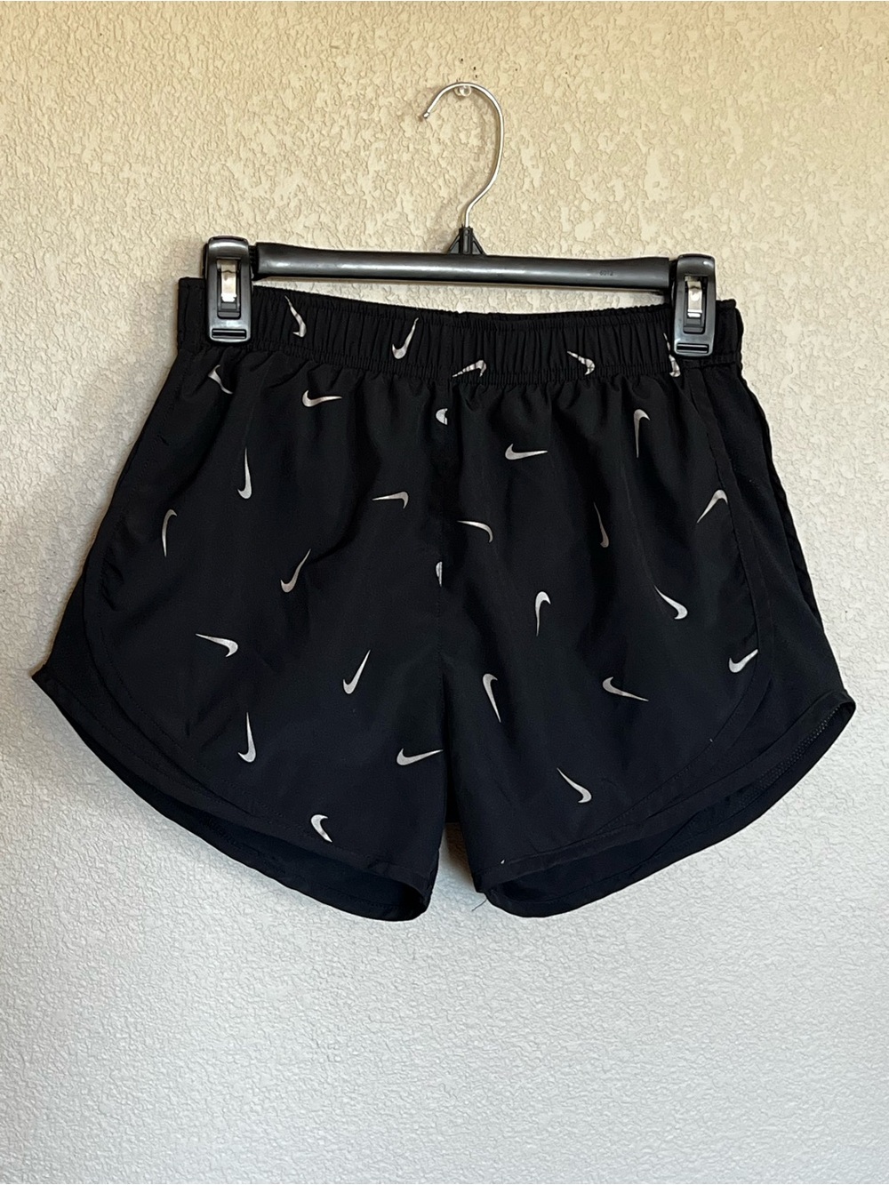 Nike Black Athletic Shorts with White Swoosh Print